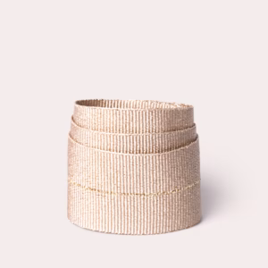Drop-needle stitch woven tape